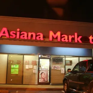 a truck parked in front of the store