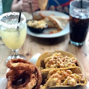 Margarita, blackened shrimp tacos with onion rings, Diet Coke, Buffalo chicken quesadilla