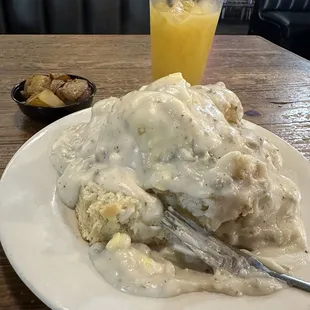 Chicken fried chicken, biscuits and cream sausage gravy.