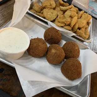 Boudin balls and fried pickles for appetizers