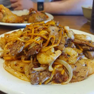 Hibachi shrimp, beef, noodles, onions, garlic