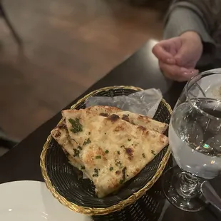 a plate of food and a glass of water