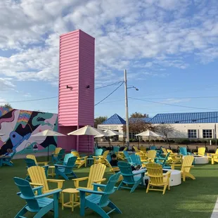 Outdoor seating... with a vertical container in the background.