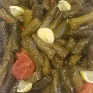 Grape leaves stuffed with meat and rice (vegetarian also available)