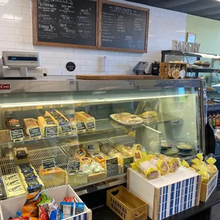 Menu and half of the cooler. Very clean, nice place!