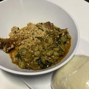 Half Egusi with chicken/ half okro with chicken!