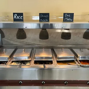 a buffet with a variety of food items