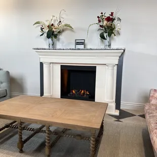 Upstairs couches and fireplace