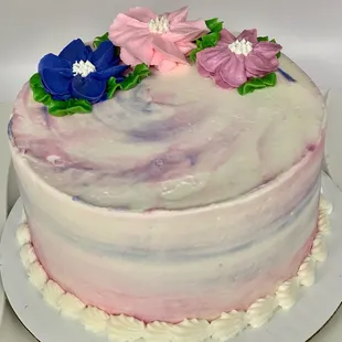 a cake decorated with flowers
