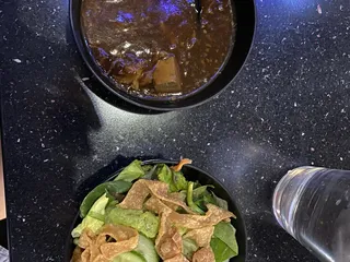 Momo Sushi Bar Wok & Grill