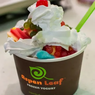 a cup of ice cream and fruit