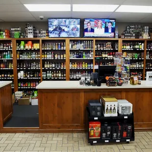 liquor shelves and televisions