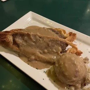 Kind of meatloaf Wellington with cheese baked in the middle... wanted to like it but it was very odd