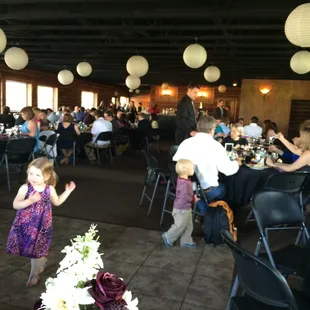 Inside for the reception.  The paper lanterns are provided by the venue and they also have cute christmas lights over the dance floor.