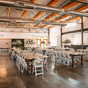 tables and chairs set up for a wedding reception
