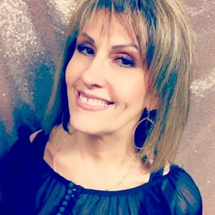 Rella Moore, Co-Owner and Stylist
