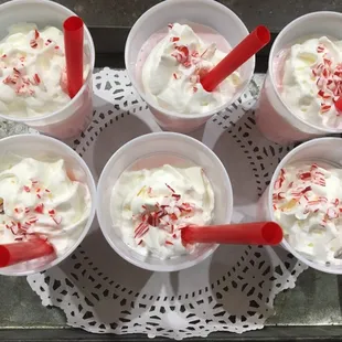 ix cups of ice cream with candy canes