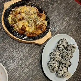 Spicy chicken with cheese and rice balls