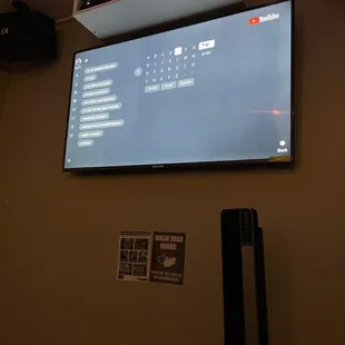 a flat screen tv mounted on a wall
