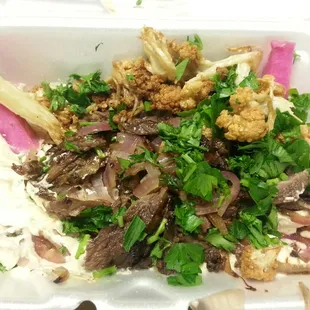 Shawarna, hummus, turnips, cauliflower, parsley and grilled onions.....delish!!!