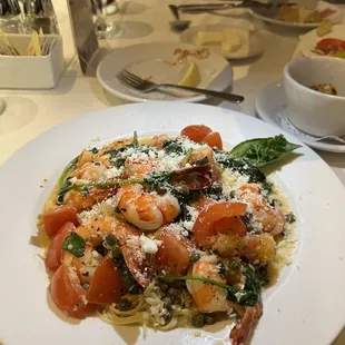 Special  chicken &amp; shrimp w/tomatoes, garlic &amp; capers. Angel hair pasta