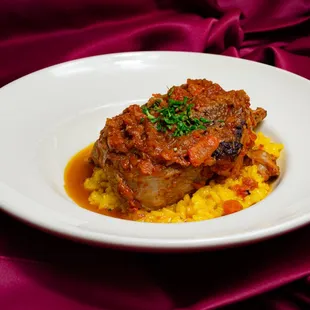 Osso Buco- Organic veal shank, braised in seasonal vegetables, over Arborio rice