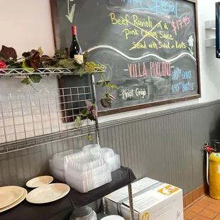 a kitchen with a chalkboard