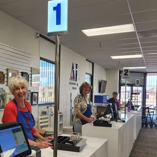 Our volunteer cashiers are happy and  ready to help you!