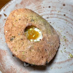 a plate with a doughnut on it