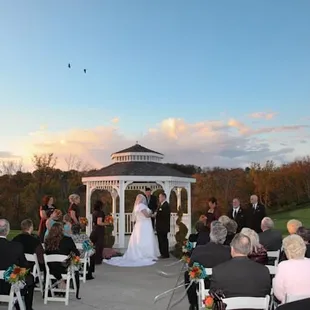 Stunning fall wedding at outdoor gazebo.