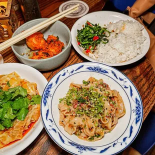 a variety of asian food on a table