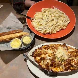 Lasagna, bread sticks, fettuccini Alfredo