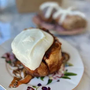 Cream cheese cinnamon roll and Easter hot cross buns