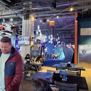 a man in a red jacket and a woman in a white shirt