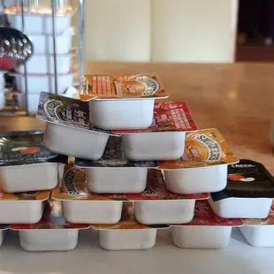 a pyramid of containers of food