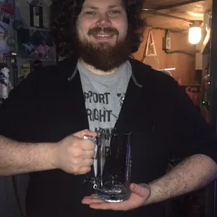 Kamren is one of are day bartender he's showing off are new gusto size mugs