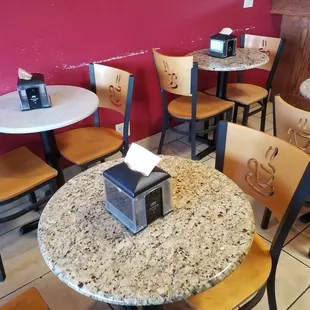 a table and chairs in a restaurant