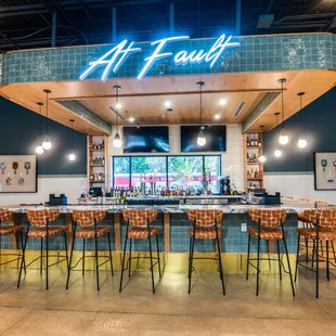 Another full service bar in the pickleball space. Features two TVs at the bar and two more 75 in. TVs adjacent to the bar.
