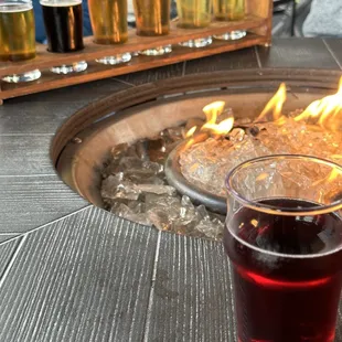 Beer flight at the patio fire pit tables!