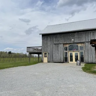 a truck parked in front of the barn
