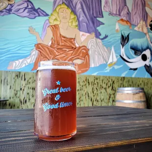 a pint of beer on a table