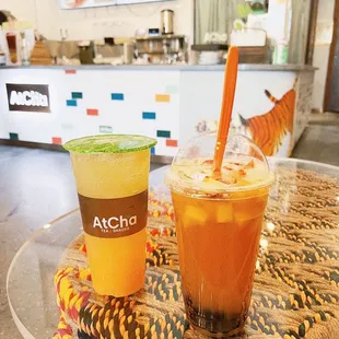 Tropical Ginger Beer on the left Fruit Tea with boba on the right