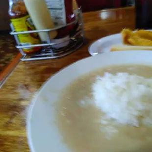 a bowl of soup and a sandwich