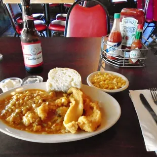 Crawfish Etouffee over rice and fried catfish served with corn, yeast bread and their fine homemade tartar sauce...Mmm, Mmm.