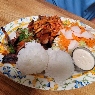 Korean chicken plate with salad. Comes with rice and kimchi