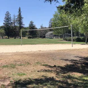 Volleyball, baseball field in back
