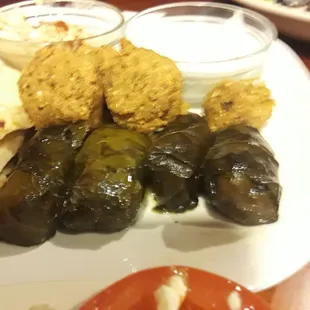 Dolma (stuffed Grape leaves) and Falafel.