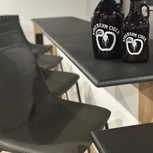 two growlers on a table
