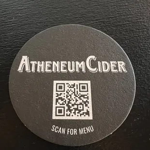 a qr code on a coaster
