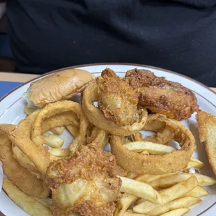Fried chicken with fries and onion rings